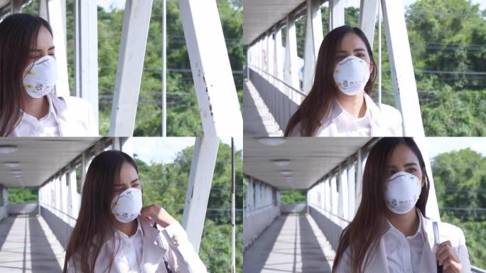 亚洲女人要上班她戴N95口罩防PM2.5粉尘雾霾