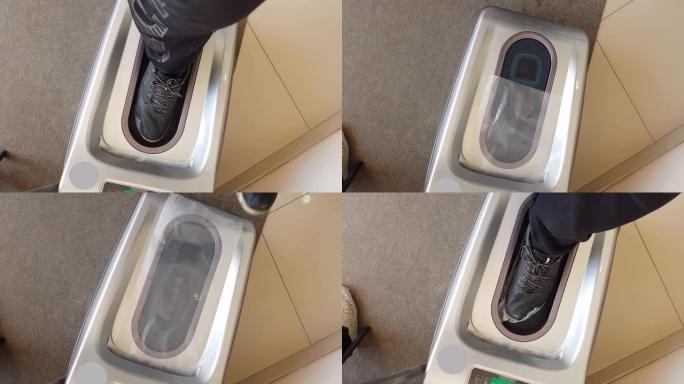 医院大厅的热自动鞋套分配器。
