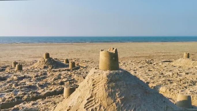 沙滩上的沙堡，背景是海洋，暑假背景视频