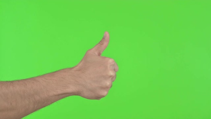 用手竖起大拇指，绿色色度键