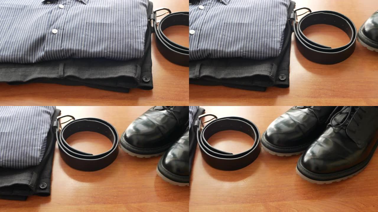 商人服装套装。正式衣橱的全景4k视频片段-裤子，衬衫，皮带和皮鞋