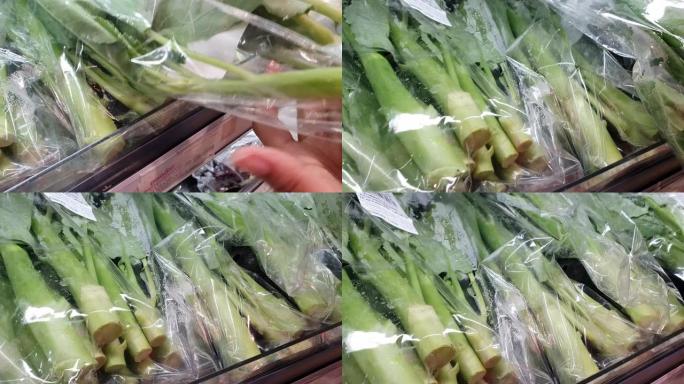 女人在超市买新鲜蔬菜