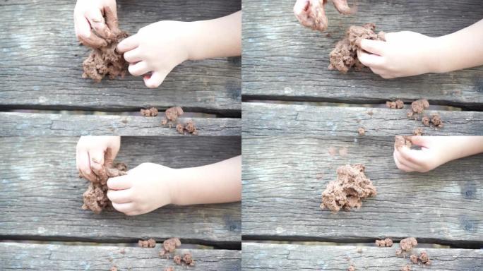 孩子们用粘土玩耍。