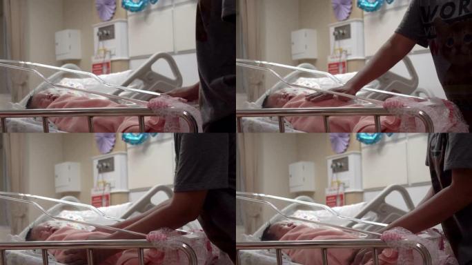 在病人康复室睡觉的小可爱新生婴儿