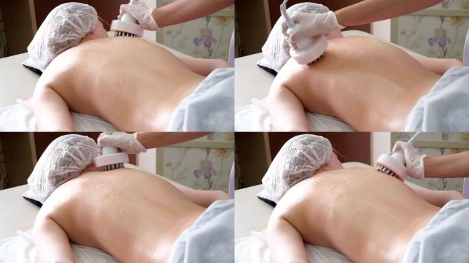 硬件美容。在美容院，闭着眼睛的快乐年轻女子接受射频提升程序的照片