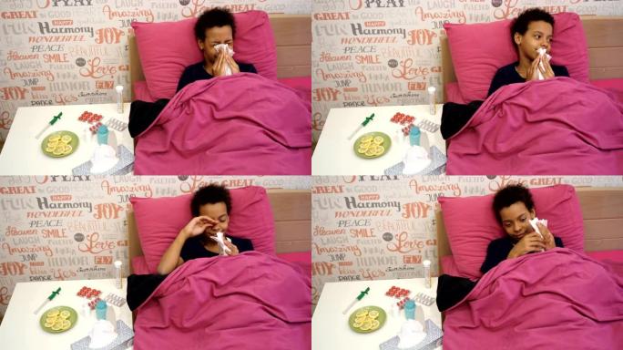 生病的女孩被毯子盖着躺在床上，发热高，流感。