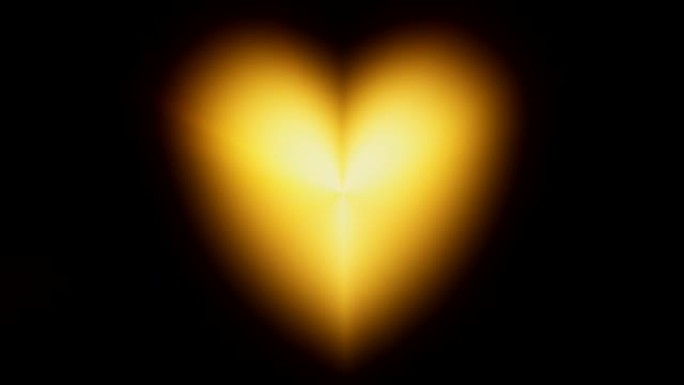 黄色心脏发光模糊闪烁的灯光运动