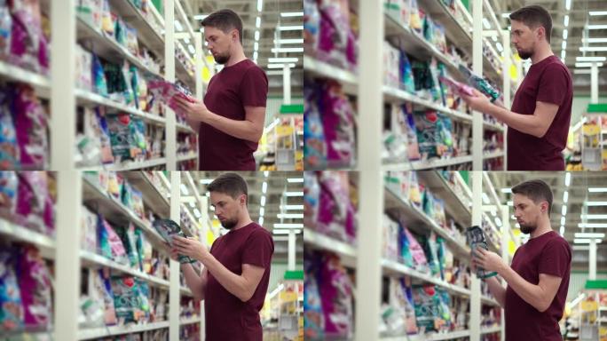 男子正在超市阅读宠物食品包装上的铭文