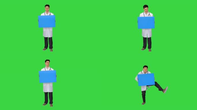 快乐微笑的男医生展示空白招牌，在绿屏上跳舞，色键
