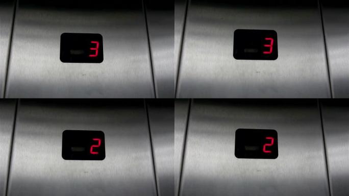电梯中的显示显示从4到1的楼层。