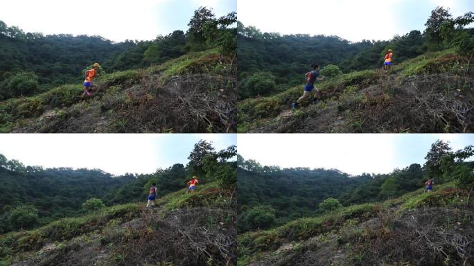 女子越野跑运动员在热带森林的山坡上奔跑