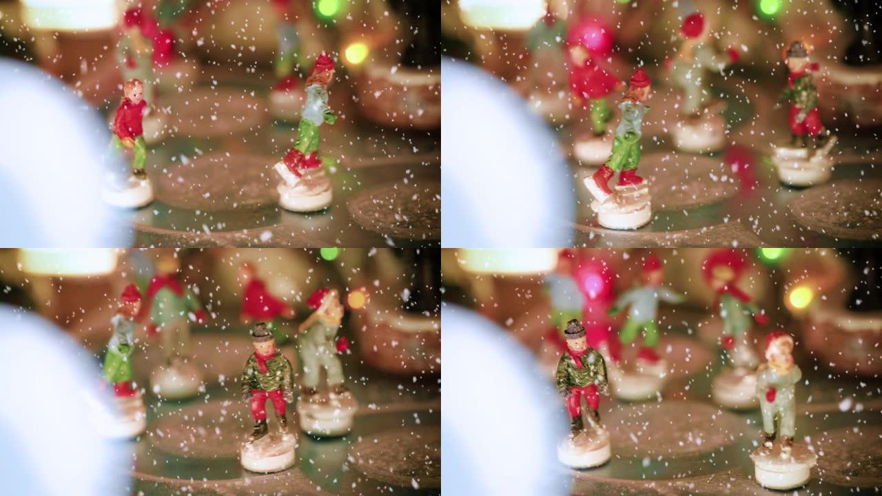 雪下一家商店的圣诞村场景特写镜头，雪下有溜冰者的小雕像 -- 圣诞活动概念