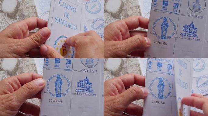 显示朝圣者护照上的最后一枚邮票，卡米诺·德·圣地亚哥