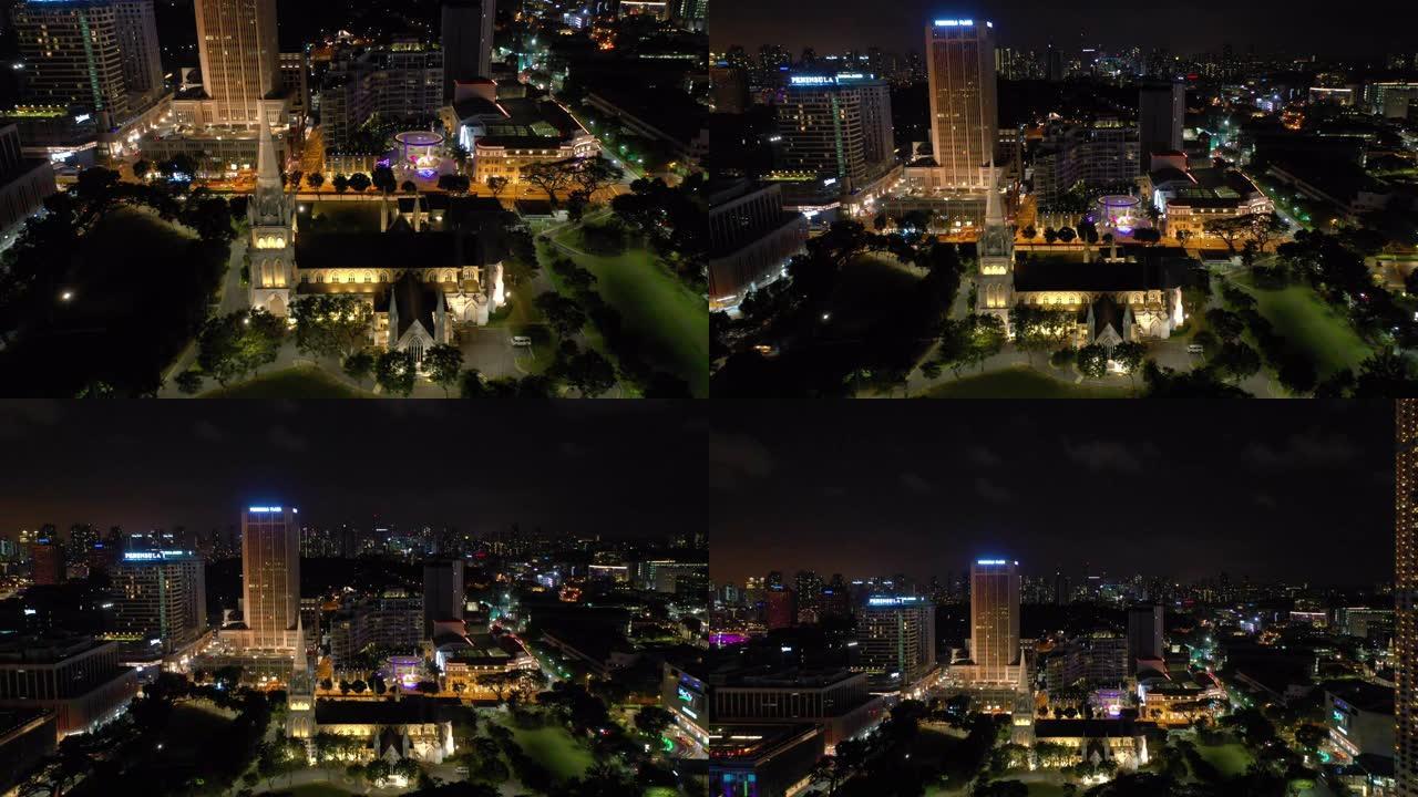 夜景照亮了新加坡市中心著名的大教堂，4k航拍全景