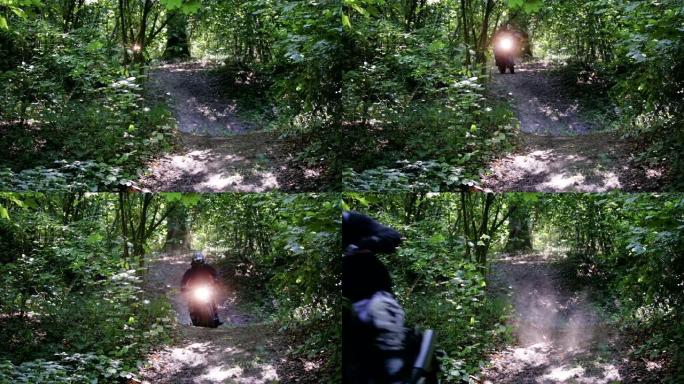戴着头盔的防护装备的男子在树木和树枝之间的森林小径上骑着极黑的耐力赛