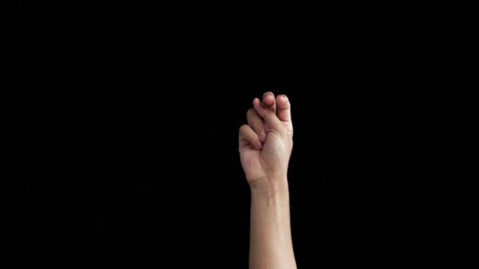 一只白种人的手被隔离在黑色上，并显示出ASL (美国手语) 的N个字母符号。