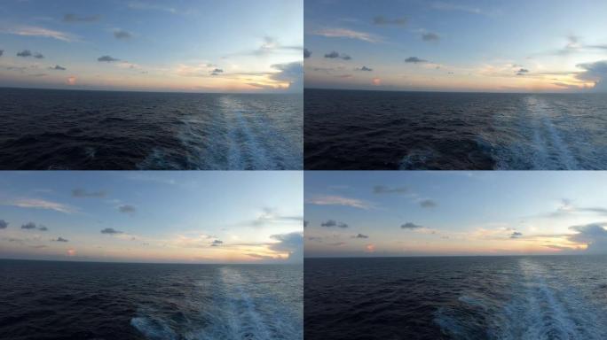 海上船后的日落