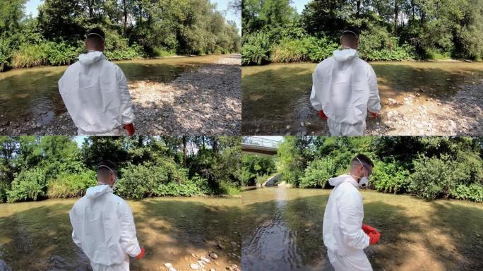 生态学家分析森林河流中的水状态
