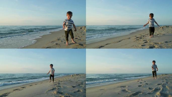 日落时在海滩上奔跑的小男孩