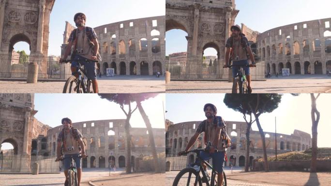 快乐的年轻人游客在日出时在意大利罗马的罗马斗兽场骑着自行车，穿着背包，衬衫和帽子。