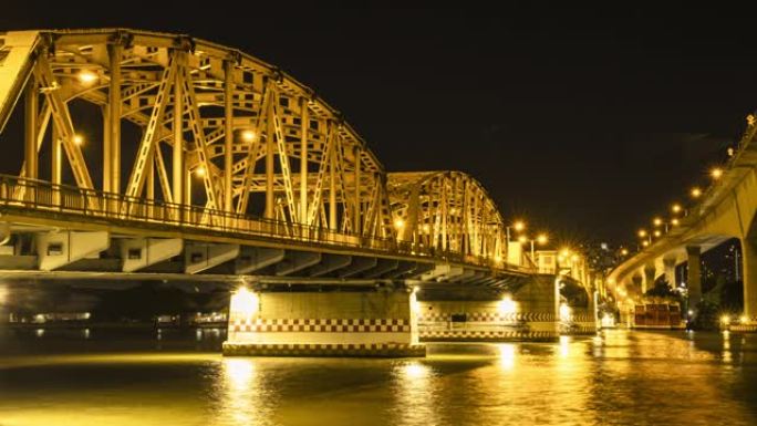 夜间在Krung Thep桥上的城市交通。Krung Thep桥位于泰国曼谷。时间流逝且可循环。高质