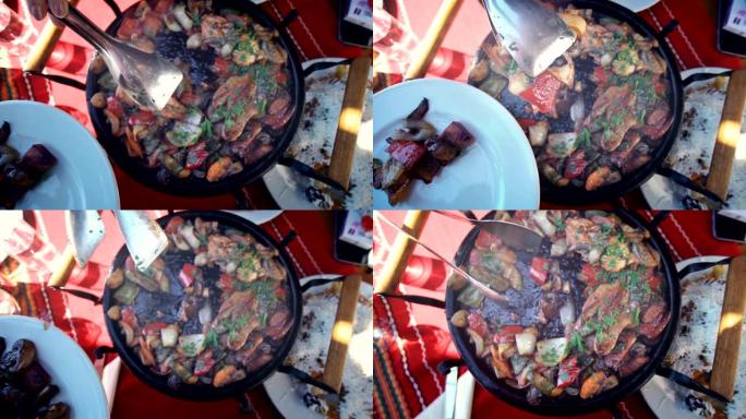 保加利亚名菜-陶瓷锅中的肉类和混合蔬菜以及背景中的传统装饰
