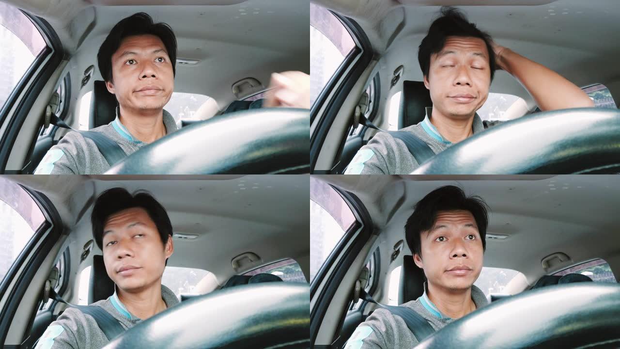 年轻无聊的亚洲男子开车堵车