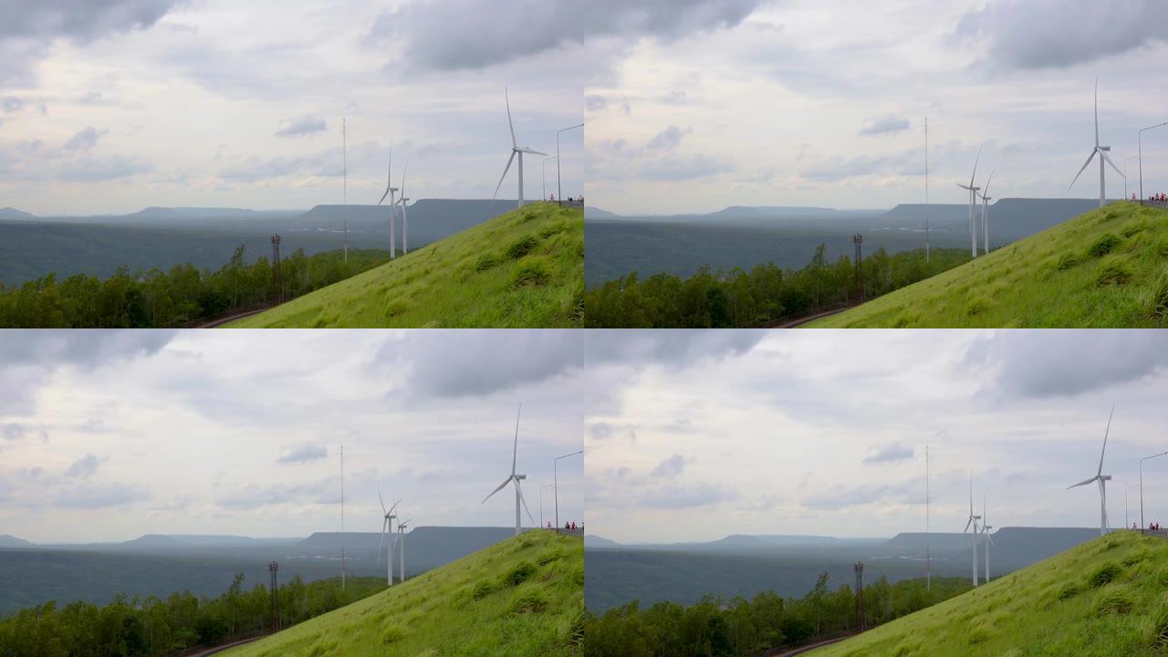 拥有风力发电机涡轮机和燃气轮机发电厂的美丽山景，节能理念