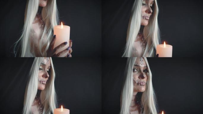 燃烧的蜡烛发出明亮的火光，黑暗的房间里有白发的女孩