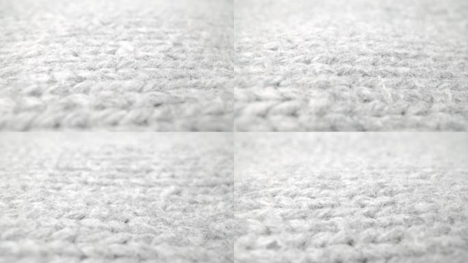 宏观多莉镜头中流动的羊毛布纹理的极端细节视图。