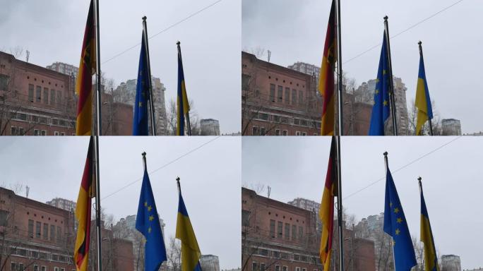 三面旗子在旗杆上飘扬——欧盟、欧盟和联合