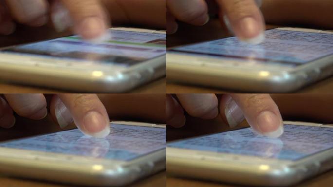 使用触摸屏平板智能手机设备4K的特写亚洲女性手