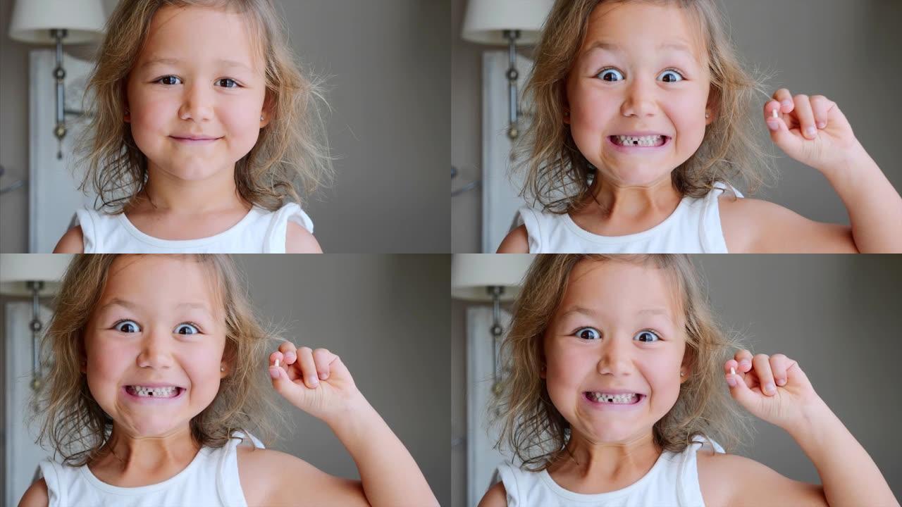小女孩的肖像正在显示她丢失的乳牙和微笑