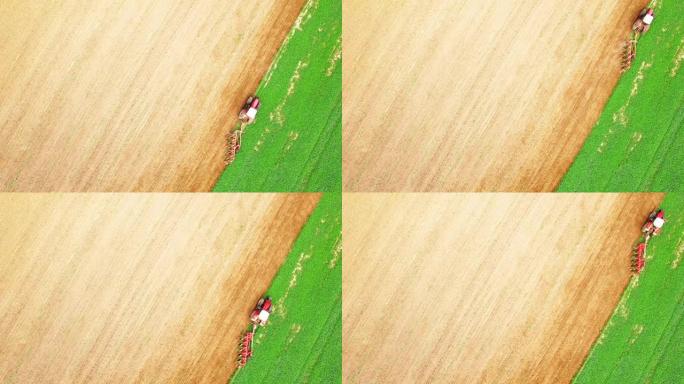 用犁在田地上作业的拖拉机的鸟瞰图。农民使用绿肥进行有机种植。农业从上面看。捷克共和国、欧盟的环保农业