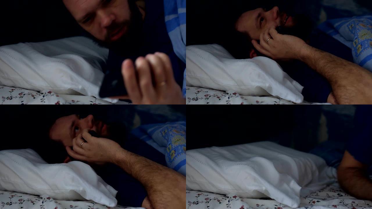 大胡子男子在矫形枕头上睡着，从电话中醒来
