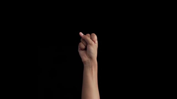 单手美国手语由男性青少年的手通过孤立的黑色背景来演示Y字母。