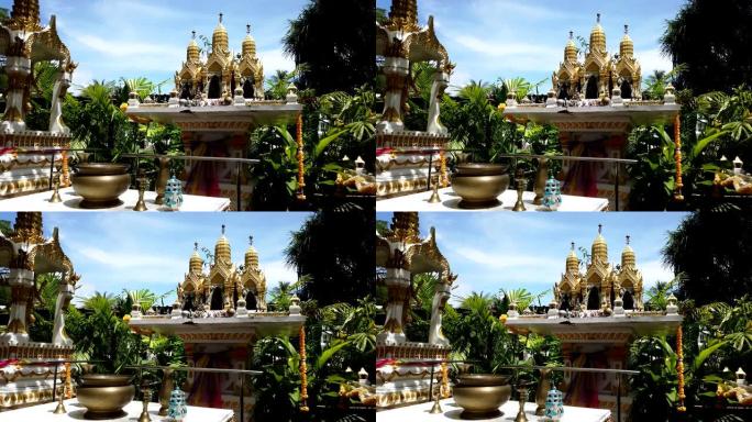 装饰泰国花园中的传统佛教祭坛，小型佛教寺庙神社