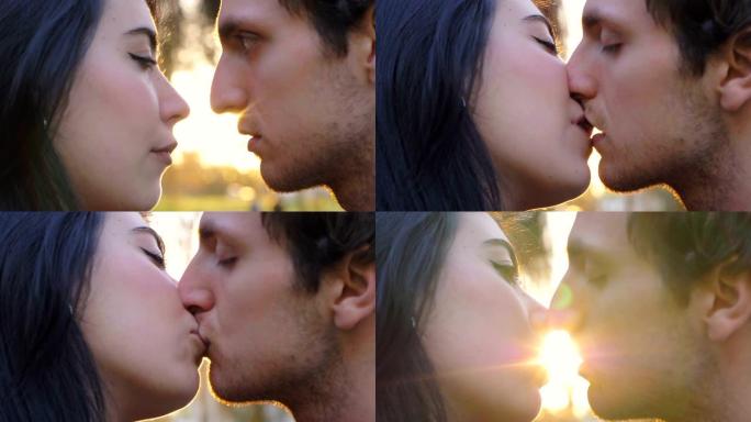 情人在日落时亲吻。情人，吸引力，浪漫-户外
