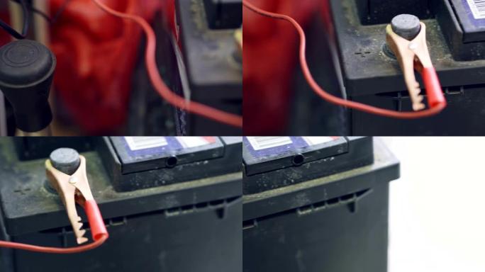 汽车电池正在充电。框架中只有正极端子可见