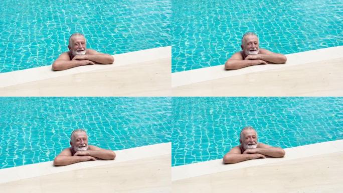 站在游泳池里的高级体育运动员。老男性在泳池边放松。老年人锻炼。成熟的运动。