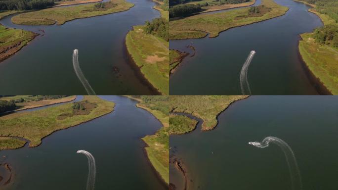男子在河上骑摩托艇，从上面看