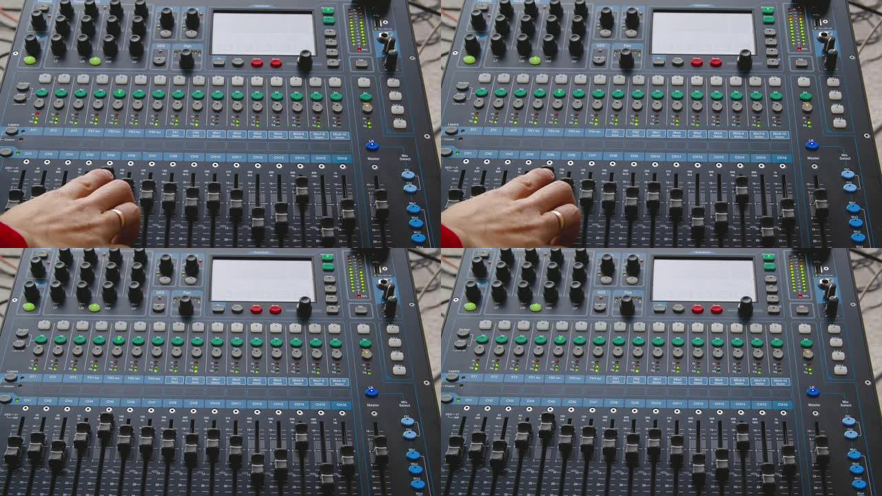 DJ控制器，用于在演奏中混合音乐。音响工程师使用控制台进行舞会。在音乐会上关闭唱片骑师控制台和混音台
