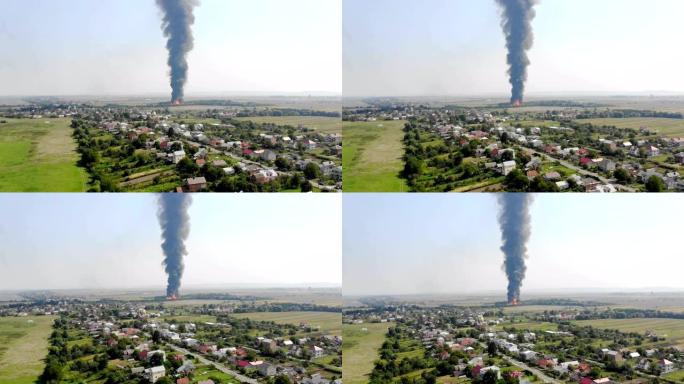四轴飞行器巨大火视图的鸟瞰图。黑烟高高升起。市郊大火