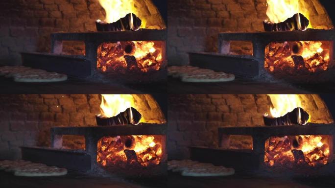 慢动作中的烤箱火和面包生产。