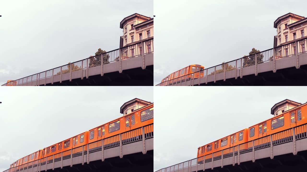 柏林地下。火车经过。黄色货车。