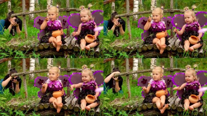拍摄照片时带着紫罗兰蝴蝶翅膀的女孩