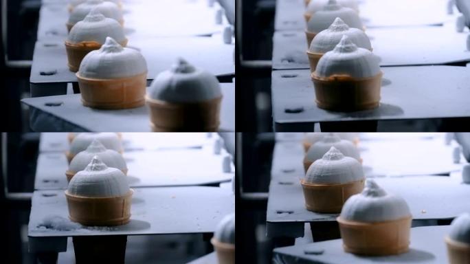 自动化技术概念-食品厂带冰淇淋锥体的传送带