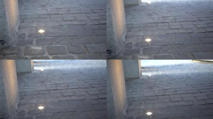 带地面嵌入式灯的鹅卵石铺路地板