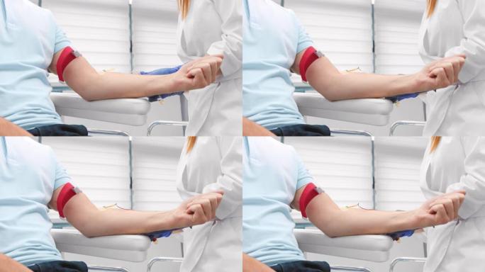 护士抽血进行富血小板血浆治疗。