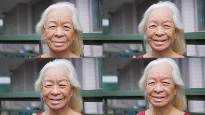 快乐的亚洲高级女性肖像。